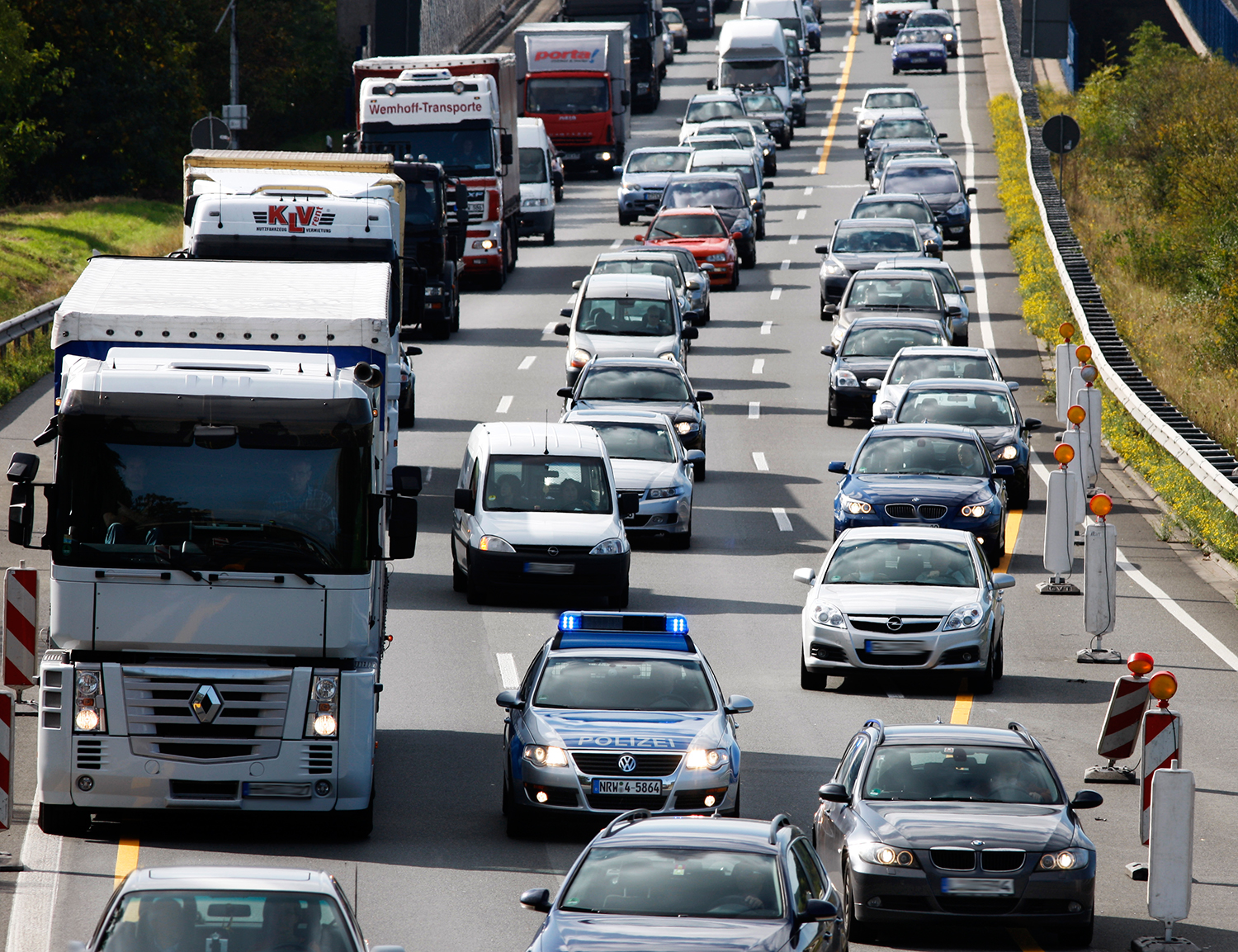 Form a lane in a traffic jam