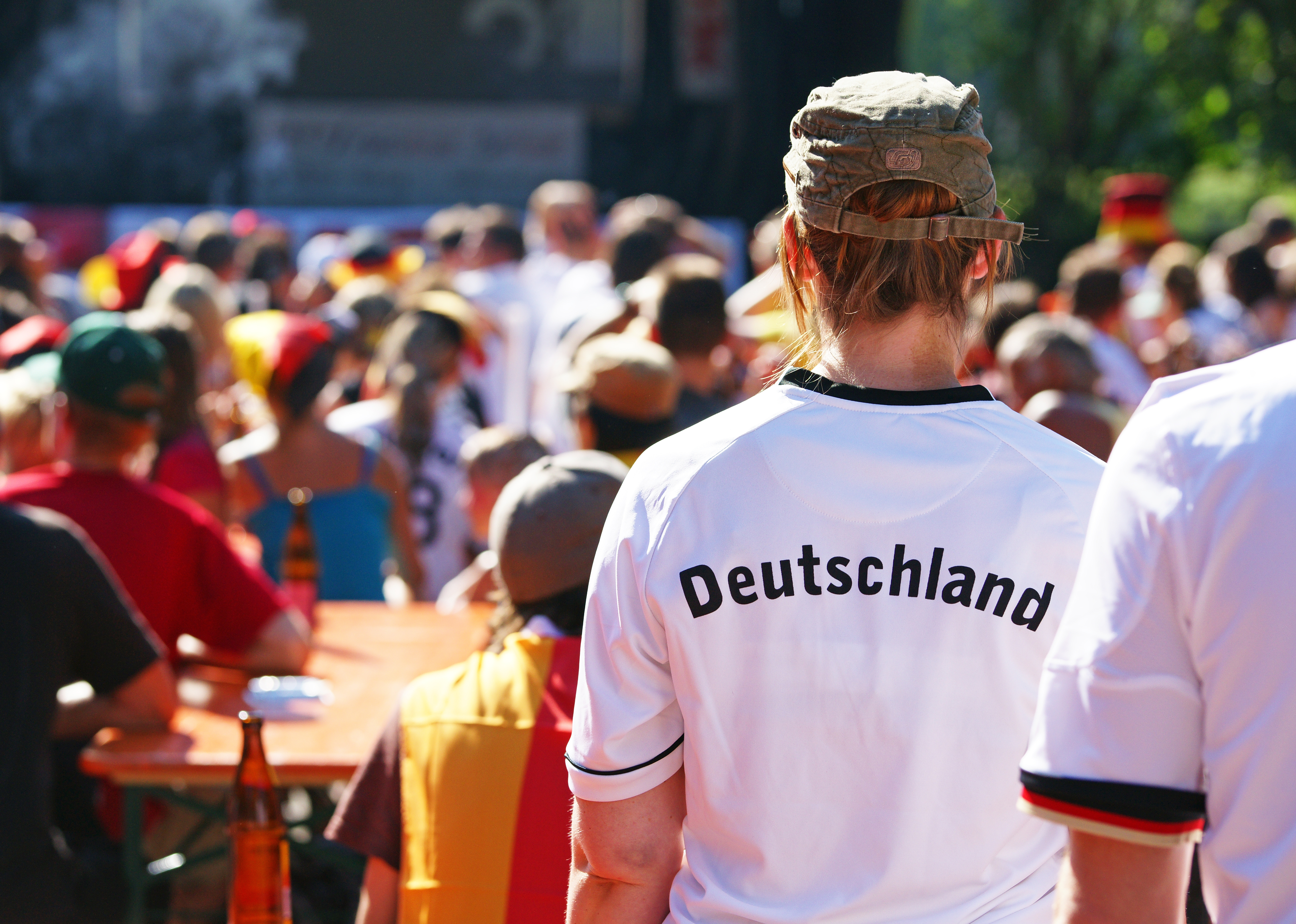 Soccer fans at public viewing from behind