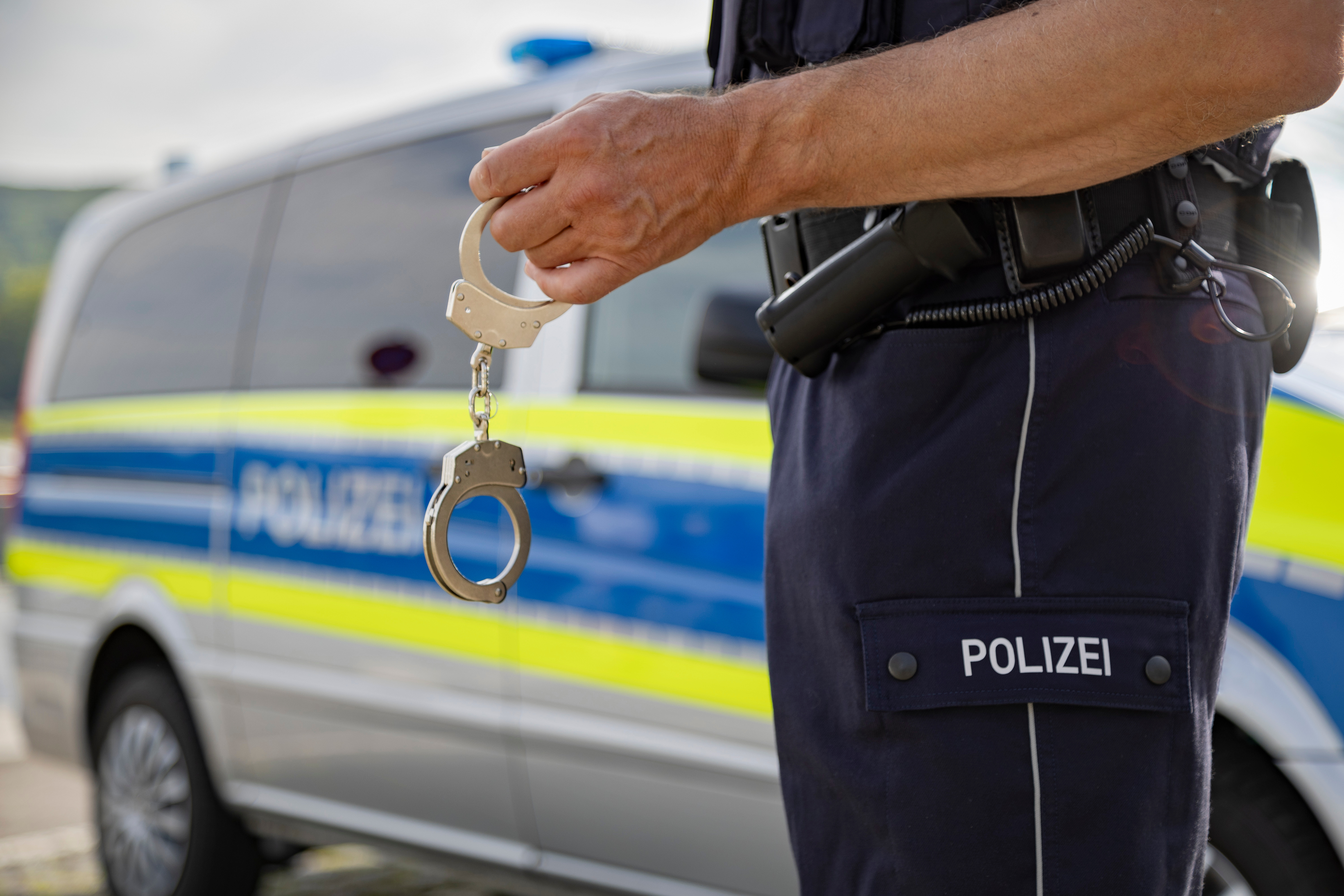 Policeman with handcuffs