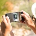 Cell phone display shows burglary